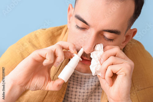 Ill young man with tissue u...