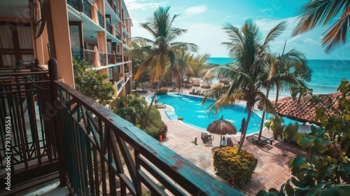 Sea view from the hotel lobby balcony with swimmimg pool. Beautiful resort at Canggu beach. Generated AI photo