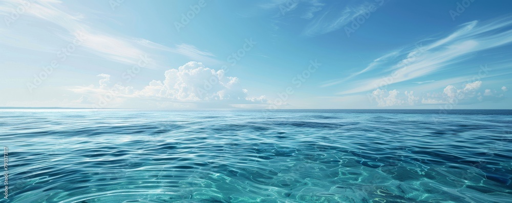 Serene panoramic view of the vast ocean under a clear sky
