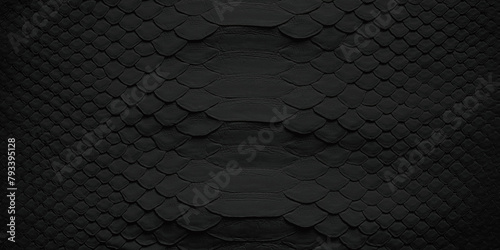 black snake skin background, natural reptile leather texture. photo