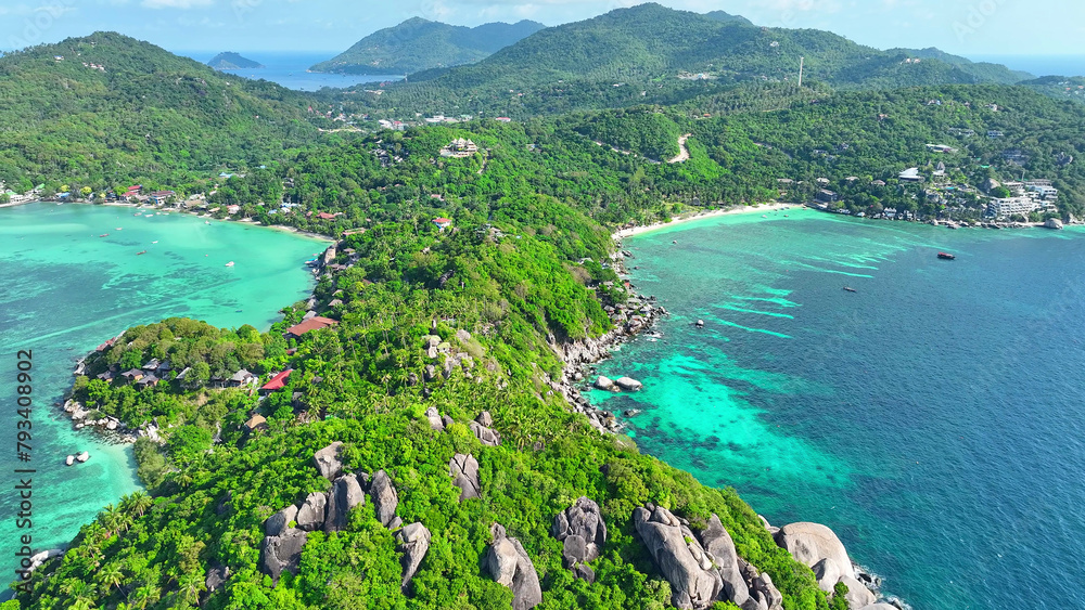 Nestled in the Gulf of Thailand, Koh Tao beckons with its pristine beaches and thriving marine biodiversity. Discover a haven for diving enthusiasts and nature lovers alike. Bird's eye view.
