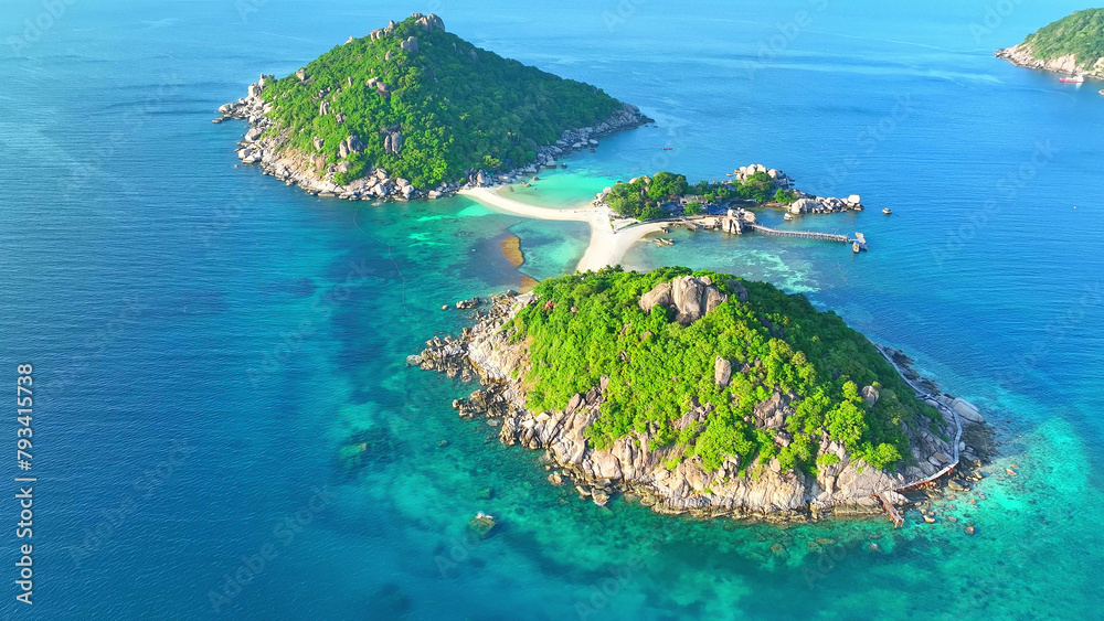 Fototapeta premium Pristine beaches, lush forests, and azure waters converge on this breathtaking island getaway. Experience nature's majesty here. Aerial drone. Koh Nangyuan, Surat Thani Province, Southern Thailand. 