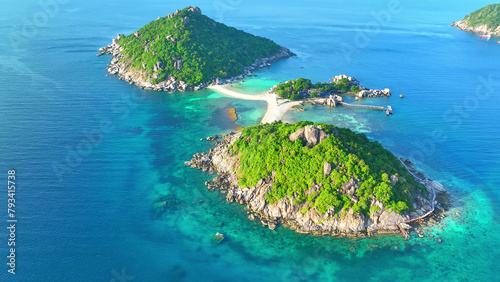 Pristine beaches, lush forests, and azure waters converge on this breathtaking island getaway. Experience nature's majesty here. Aerial drone. Koh Nangyuan, Surat Thani Province, Southern Thailand.
 photo