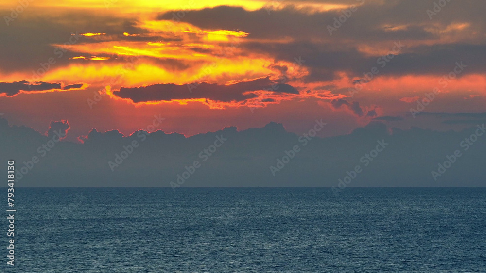 Capture the vast expanse of the endless sea under a golden sunset with a majestic sun, seen from above through drone aerial view. Bird's eye view. Tropical sea background.
Capture the vast expanse of the endless sea under a golden sunset with a majestic sun, seen from above through drone aerial view. Bird's eye view. Tropical sea background.