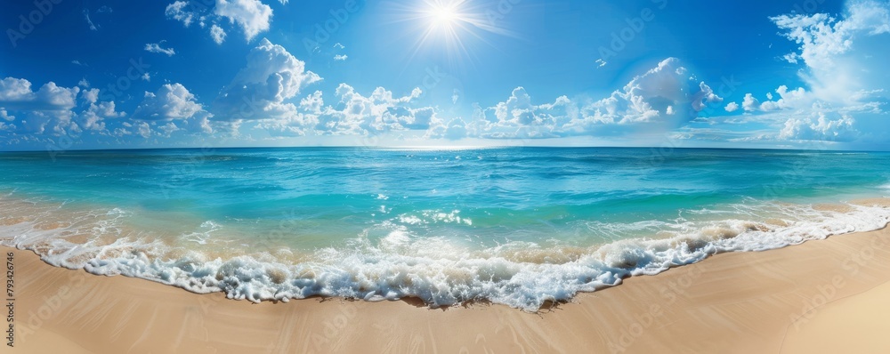 Wide-angle view of a sunlit tranquil beach with clear blue skies