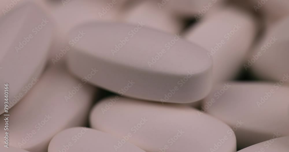 white pills close-up for medical care , unpacked white pills