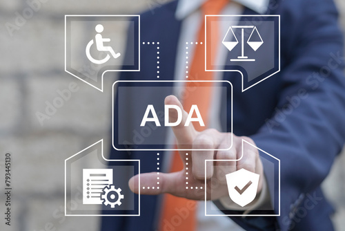 Business man working on virtual touch screen presses abbreviation: ADA. ADA Americans with Disabilities Act concept. Disability Law Social Services.