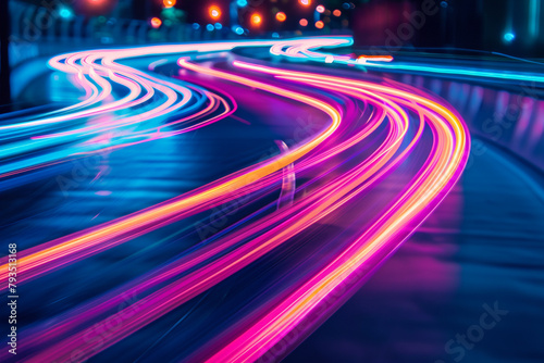 Neon light trails captured with a slow shutter speed, creating abstract designs.