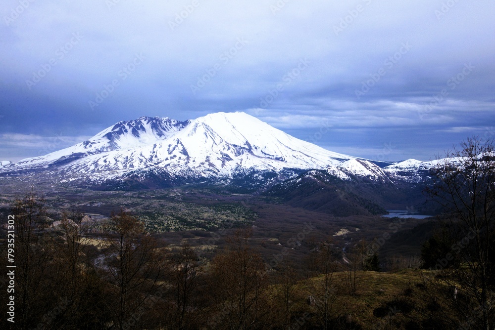 Mount St Helens and the surrounding parkland, taken from a high vantage point on a cloudy day. 