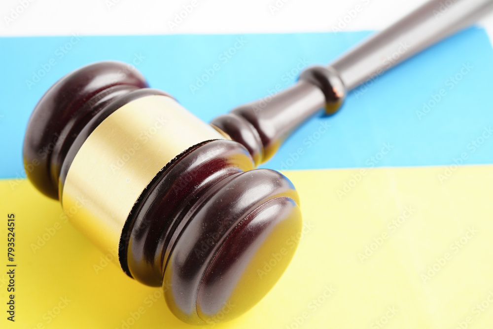 Ukraine, Legal, justice and agreement, wooden court gavel on flag.