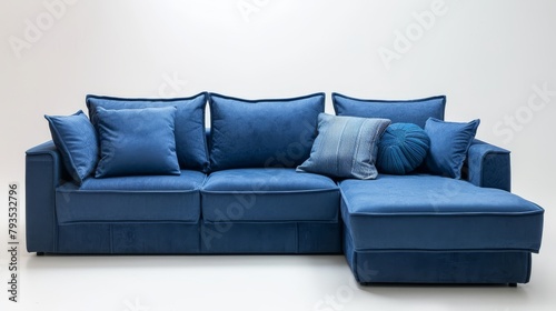 Transformable blue corner sofa in a minimalist and eco-friendly design, ideal for compact living, against an isolated background