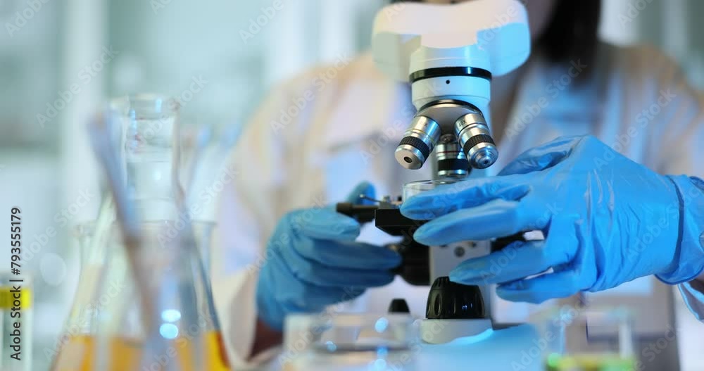 Microscopic analysis of a chemical substance in a petri dish in a laboratory Microscopic analysis of a chemical substance in a petri dish in a laboratory