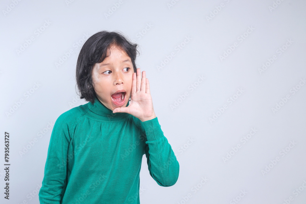 Young Girl Announce To The Side Isolated on White Background Young Girl Announce To The Side Isolated on White Background
