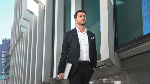 Photography Handsome 30s top manager walking in formal suit
