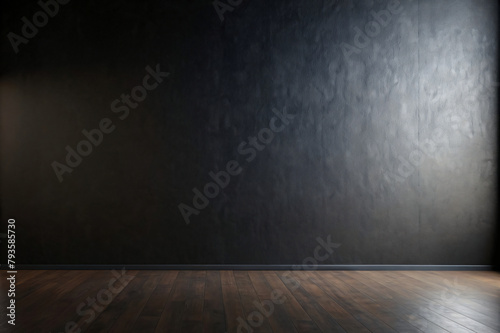 Grungy black concrete wall with textured light reflecting off a worn metal floor in a dark vintage interior