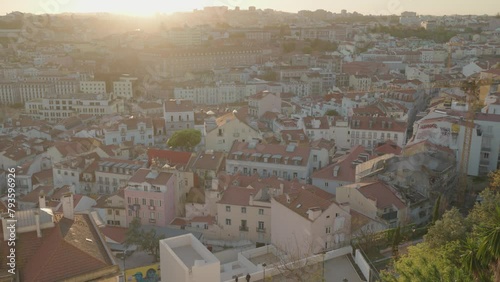 Sunset with a view of Lisbon city from atop Miradouro da Graca, Lisbon Portugal photo
