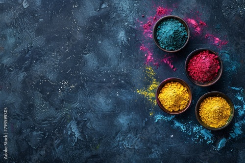 Vibrant Assortment of Holi Festival Colors in Wooden Bowls on a Dark Background