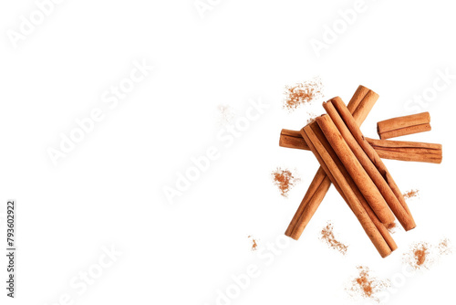 A Pile of Cinnamon Sticks on White Surface photo