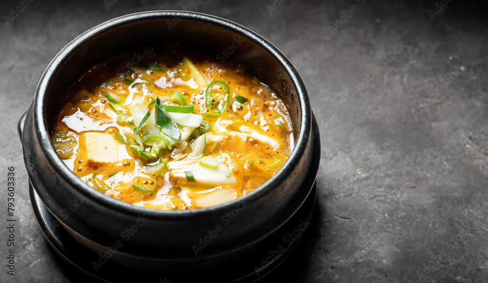 Soybean paste stew in an earthenware bowl, Korean food Soybean paste stew in an earthenware bowl, Korean food