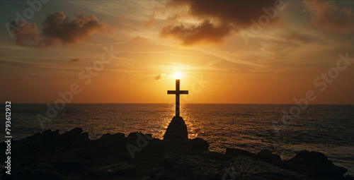 A solemn cross silhouette stands out against a dramatic ocean sunset, evoking reflection.