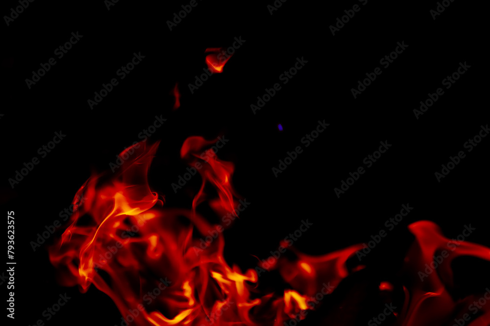 Fototapeta premium Background of the flame in the oven. Overlay layer. Tongues of fire in a fireplace.