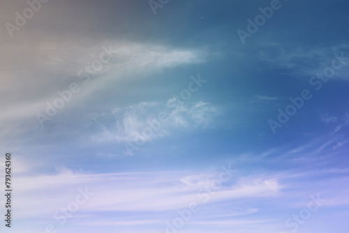 Beautiful sunset sky above clouds with dramatic light. Cabin view from airplane