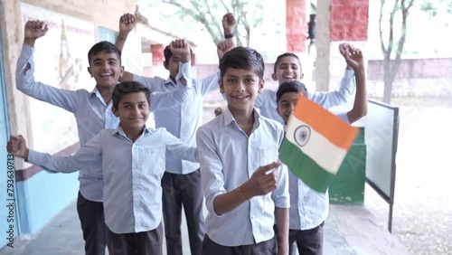 Group of proud schoolboys students hold indian flag celebrating Independence day, Republic day, patriotism, education, people of india. Cricket fan cheering for team. photo