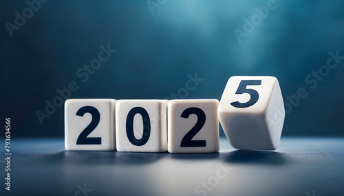 2025 number of with change to new era concepts. Flipping the 2024 to 2025 year calendar numbers on white dice, cube blocks isolated on dark blue banner background, minimalist simple style