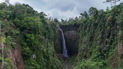 Aerial View of Kabut Pelangi Waterfall is the most beautiful waterfall in Indonesia. Java Island. High quality 4k footage photo