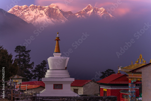 Stunning shot of Buddhistic temple and stupa in Thengboche, Khumbu Nepal with great mountain wall in the background