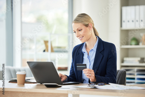 Business woman, laptop and credit card for online shopping, ecommerce and purchase on a website at work. Office, desk and internet payment at a company with a smile from digital store deal and sale