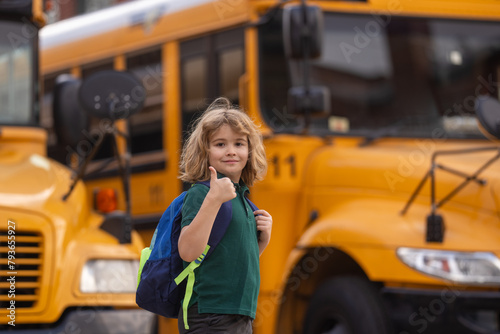 Educational concept. Child getting on the school bus. American School. Back to school. Kid of primary school. Happy children ready to study.