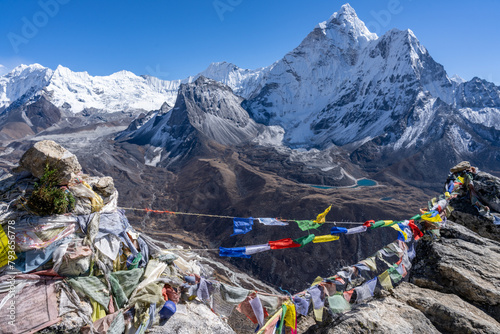 Superb view over Himalayas and Ama dablam with tibetian prayer flags photo