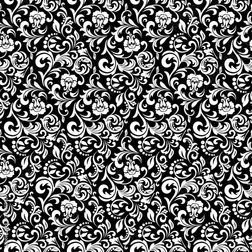 Wallpaper in the style of Baroque. Seamless vector background. White and black floral ornament. Graphic pattern for fabric, wallpaper, packaging. Ornate Damask flower ornament.