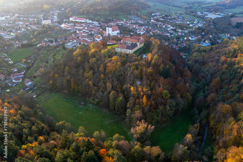 Aerial shot of the centre of Lomnice city, Czech republic, in amazing autumn atmosphere with its historic centre. photo