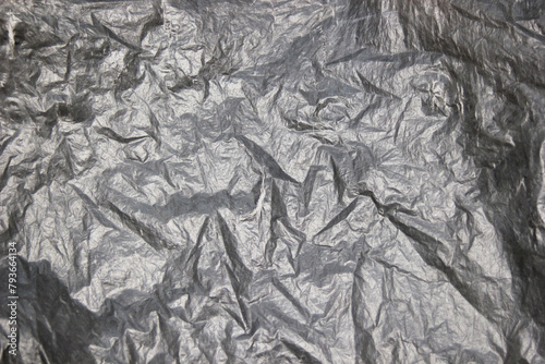 Crumpled aluminum foil texture as background
 photo