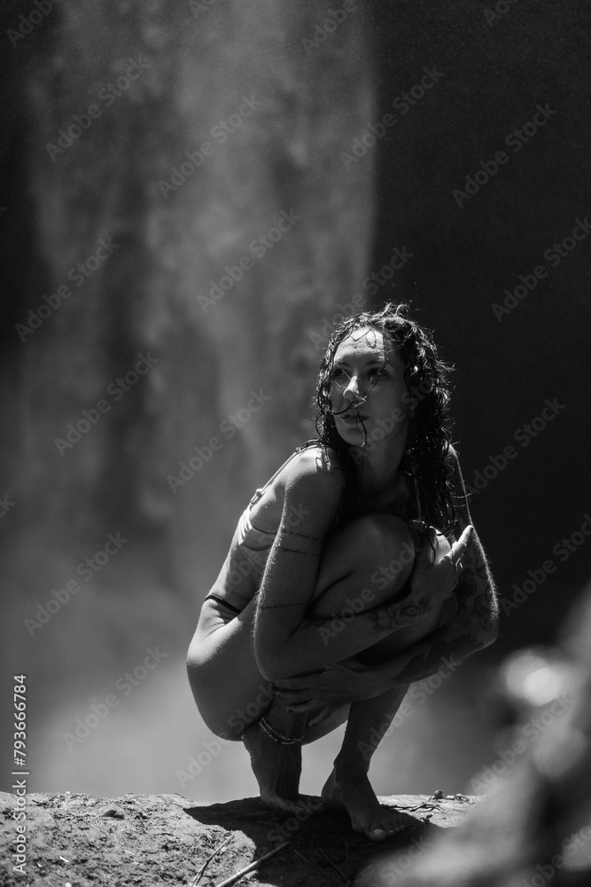 Woman traveler at the waterfall Nung Nung. Woman traveler at the waterfall Nung Nung.