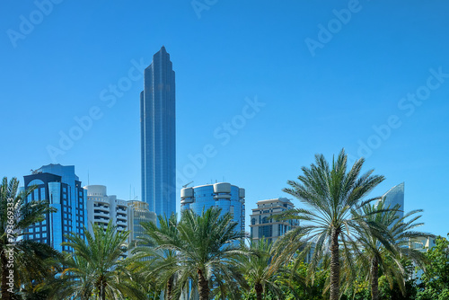 Abu Dhabi, Arab Emirates - February 16, 2023: Modern urban architecture of the business part of the city. Dominated by high-rise buildings. An example of urban greening, landscaping of cities © max5128