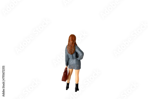 Miniature Business Woman holding suitcase standing isolated on white background with clipping path