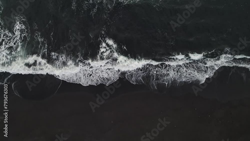 top view of the black sand beach on one of the beaches of Kamchatka photo