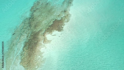 Sand Bar Reef - Balos Beach, Crete Greece. 4K Aerial Drone Shot Looking Down at Crystal Clear Shallow Blue Waters. Greek Tourist Destination, Kriti. photo