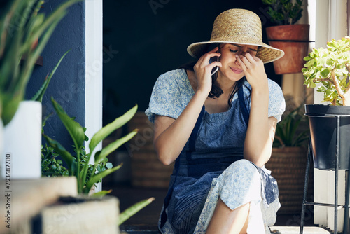 Woman, phone call and garden with crying from sad news, conversation and discussion at home. Housewife, outdoor and tears with emotional, stress and sorrow from heartbreak or upset and disappointed