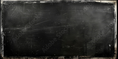  dark blackboard with a thin white border around the edges. The background is plain and blank, suitable for writing or drawing ,black Distressed Grunge wall background photo