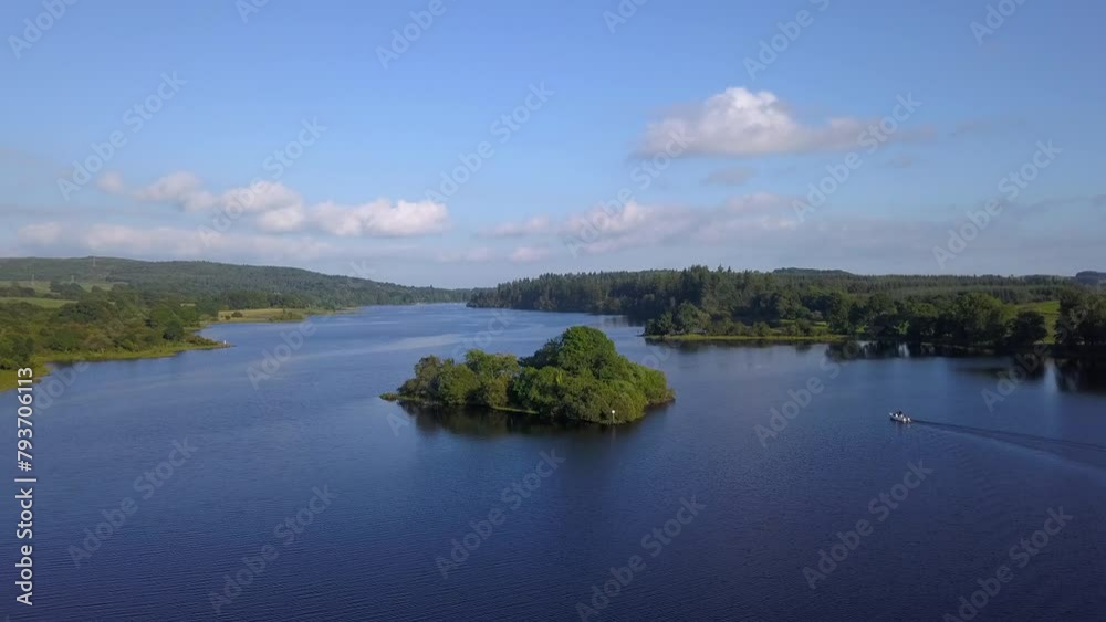 Drone shot of small island in Loch Ken, Dumfries, Scotland