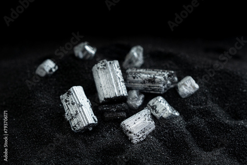 Pure silver or platinum or rare earth from the mine that was placed on the black sand