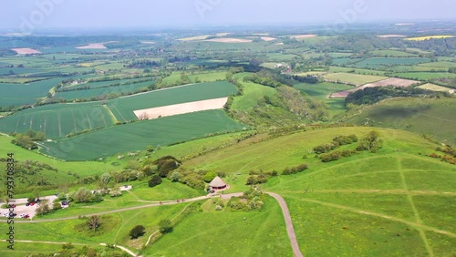 Aerial flying over Butser Hill Sunny day UK 4K photo