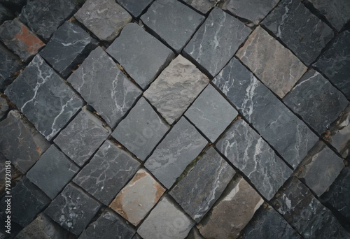 A rough and varied texture of closely packed stones, each with a unique pattern and a blend of earthy tones.