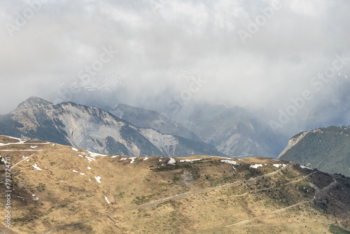 Aerial drone view of  French Alps Mountains glacier near Grenoble. Europe alps in winter. Les deux alpes resort. Winter mountains beautiful alpine panoramic. Mountains aerial snow winter view.