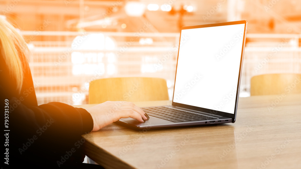 Young white woman working on computer with blank copy space screen on table in home office. close up female businesswoman hands typing text, surfing internet on modern laptop. mock up, front view Young white woman working on computer with blank copy space screen on table in home office. close up female businesswoman hands typing text, surfing internet on modern laptop. mock up, front view