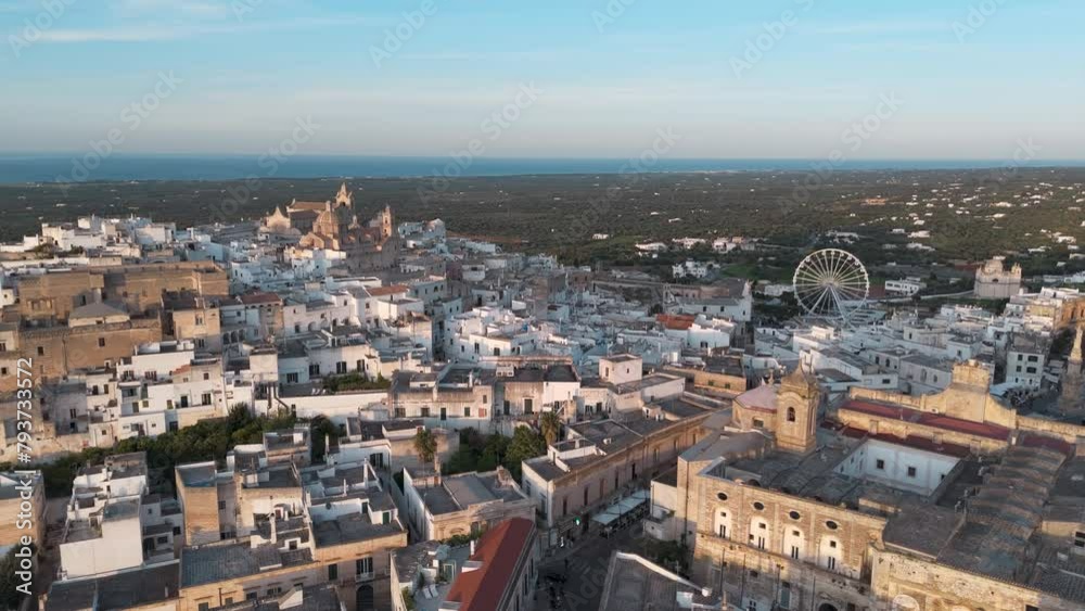 Aerial View of a Historic Mediterranean Town Ostuni with Ferris Wheel Aerial View of a Historic Mediterranean Town Ostuni with Ferris Wheel